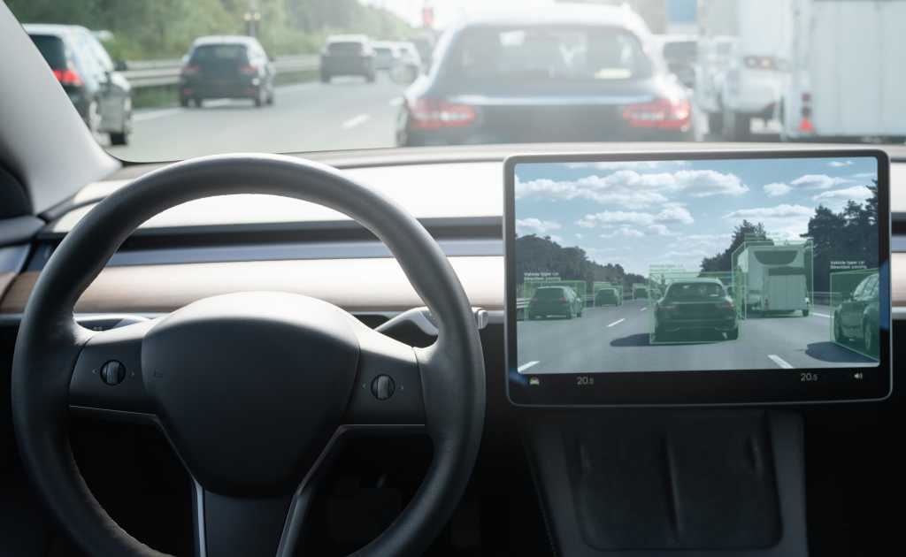 shutterstock 2281315585 inside view of self driving car on a road. Autonomous vehicle.